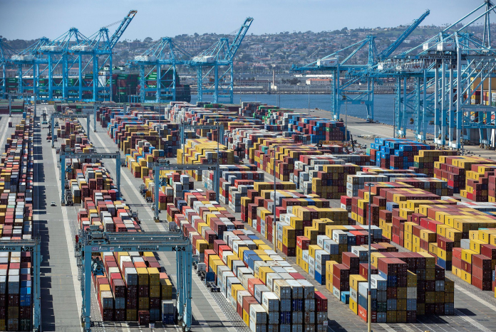 Import volumes at key West Coast ports surge amid labor strikes and global trade war fears.